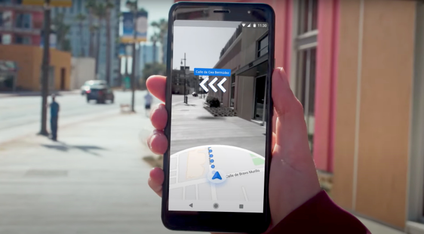 A smartphone showing Google Maps Live View.