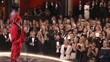 Viola Davis accepts the award for best actress in a supporting role for "Fences" at the Oscars on Sunday, Feb. 26, 2017, at the Dolby Theatre in Los Angeles.