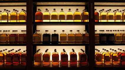 Bottles of Suntory Holdings single cask whisky are displayed at its Yamazaki Distillery in Shimamoto town, Osaka prefecture December 15, 2013.