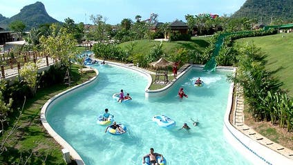 People float on a lazy river at Ramayana Water Park.