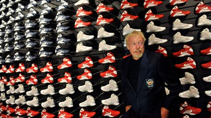 Nike founder Phil Knight, a member of the 2012 class of inductees into the Basketball Hall of Fame, waits to be interviewed by the media at the Naismith Memorial Basketball Hall of Fame in Springfield, Mass., Thursday, Sept. 6, 2012. Knight will be inducted into the Hall on Friday. (AP Photo/Jessica Hill)