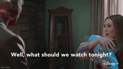 A GIF from Wandavision of a woman saying What should we watch tonight?