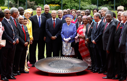 Britain's Queen Elizabeth II poses for photographs with heads of government and representatives of Commonwealth nations in London on June 6, 2012.