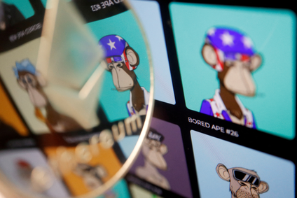 A image of a monkey wearing a red, white, and blue helmet is reflected in a glass circle.