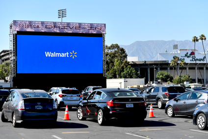 A Walmart logo is displayed on a drive-in screen in Pasadena, California.