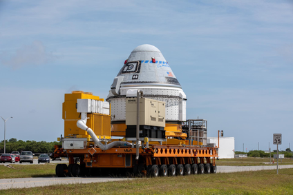 Boeing’s CST-100 Starliner spacecraft rolls out from the company’s Commercial Crew and Cargo Processing Facility at NASA’s Kennedy Space Center in Florida on May 4, 2022.