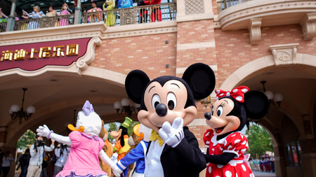 Disney characters Mickey Mouse and Minnie Mouse greet visitors at Shanghai Disney Resort as the Shanghai Disneyland theme park reopens following a shutdown due to the coronavirus disease (COVID-19) outbreak, in Shanghai, China May 11, 2020.
