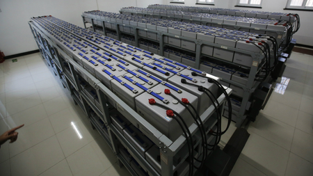 Batteries saving electricity produced by solar power is seen at PetroChina&#039;s Yizhuang gas station which has solar power system in Beijing January 9, 2015.