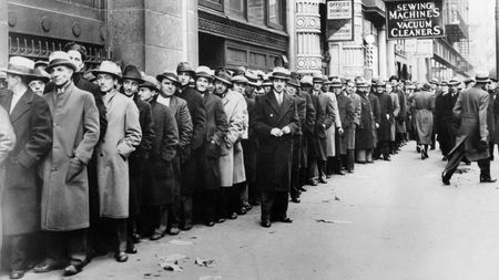 People wait outside the State Labor Bureau for federal relief jobs in New York City in November 1933. (AP Photo)