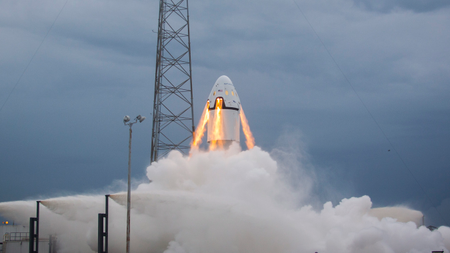 SpaceX&#039;s Dragon II demonstrates its launch escape system in 2015.