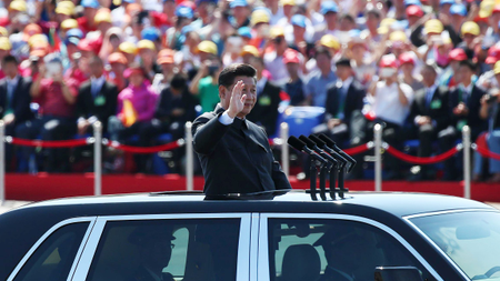 Chinese President Xi Jinping waves from a car as he reviews troops on Tiananmen Square during the military parade marking the 70th Anniversary of the Victory of Chinese People&#039;s Resistance against Japanese Aggression and World Anti-Fascist War at Tiananmen Square in Beijing, China, 03 September 2015. China holds a military parade on 03 September, as one of the events taking place around the World marking the 70th Anniversary of the WWII Victory over Japan Day which marks the day Japan officially accepted the terms of surrender imposed by the by Allied Forces in the Pacific conflict.