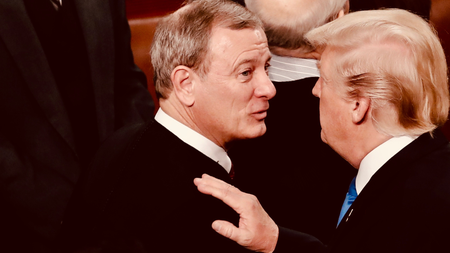 Donald Trump taps John Roberts on the shoulder.