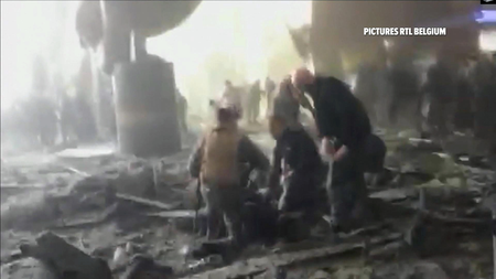 Still from a television image showing the aftermath of the airport bombing.