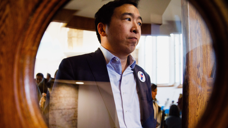 Democratic Presidential candidate Andrew Yang leaves Saturday, April 27, 2019, during the Reaching Rural Voters Rural Caucus Forum at the Saints Center for Culture and the Arts in Stuart, Iowa.