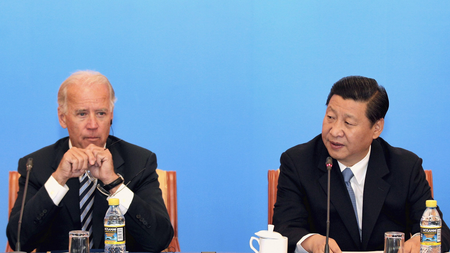 China&#039;s Vice President Xi Jinping (R) speaks next to U.S. Vice President Joe Biden during a discussion with U.S. and Chinese business leaders at Beijing Hotel in Beijing August 19, 2011.