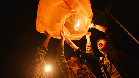 Students launch a Kongming lantern asking for success in the upcoming national college entrance exam, or &quot;gaokao&quot;, in Luan, Anhui province, China June 1, 2018.