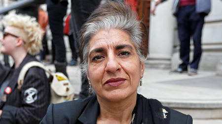 Farhana Yamin, an environmental lawyer and Extinction Rebellion activist, poses for a photograph in front of HM Treasury in Westminster during the Extinction Rebellion protest in London, Britain April 25, 2019.