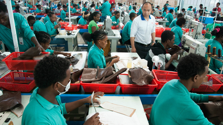 Ethiopian workers and Chinese management in the Huajian shoe factory in the Eastern Industry Zone near Addis Ababa, a Special Economic Zone modelled after China’s southern city of Shenzhen.