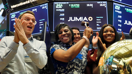 Jumia co-CEO Sacha Poignonnec applauds and Jumia Nigeria CEO Juliet Anammah