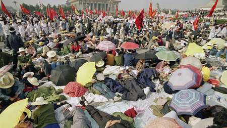 Beijing University students relax in Tiananmen Square as their hunger strike for democracy begins a fourth day on Tuesday, May 16, 1989.