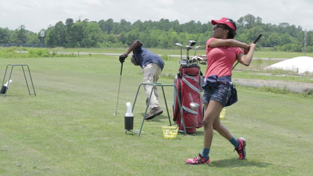 Tameka Norris playing golf