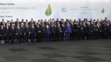 Heads of states and governments pose for a family photo during the opening day of the World Climate Change Conference 2015