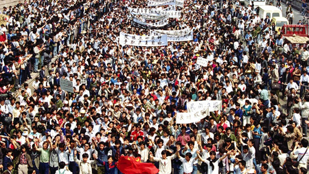 Thousands of students from local colleges and universities march to Tiananmen Square on May 4, 1989.