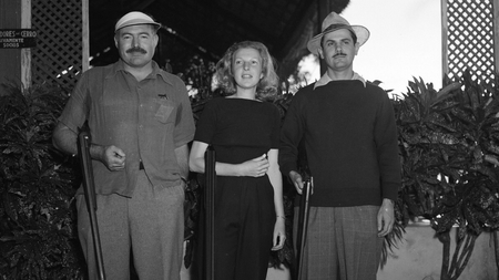Author Ernest Hemingway, left, is shown with his wife Martha Gellhorn and Elicio Arguelles at a live pigeon shoot in Havana, Cuba, Feb. 9, 1942.