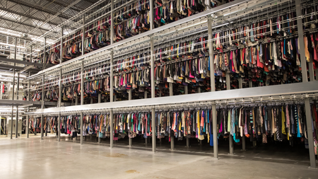 One of ThredUp&#039;s giant storage spaces filled with clothing.