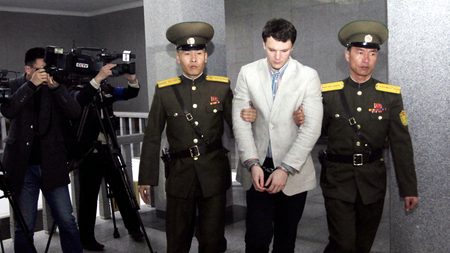 American student Otto Warmbier, center, is escorted at the Supreme Court, Wednesday, March 16, 2016, in Pyongyang, North Korea. North Korea&#039;s highest court sentenced Warmbier, a 21-year-old University of Virginia undergraduate student, from Wyoming, Ohio, to 15 years in prison with hard labor on Wednesday for subversion. He allegedly attempted to steal a propaganda banner from a restricted area of his hotel at the request of an acquaintance who wanted to hang it in her church.