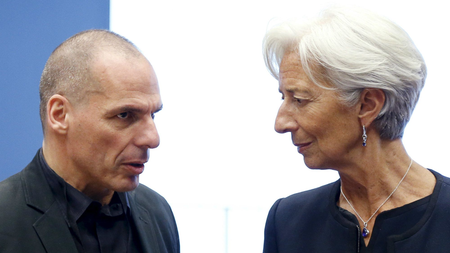 Greek Finance Minister Yanis Varoufakis talks to International Monetary Fund (IMF) Managing Director Christine Lagarde (R) during a euro zone finance ministers meeting.