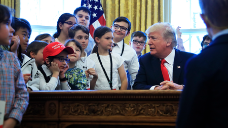 President Donald Trump talks to children in the Oval Office in celebration of &quot;Bring Our Daughters and Sons to Work Day&quot; at the White House in Washington, Thursday, April 26, 2018.