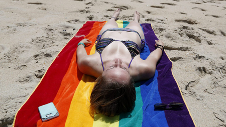 woman on beach towel