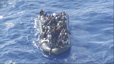Some 93 immigrants are seen crammed onto a rubber dinghy filmed from a Guardia di Finanza police helicopter near the southern coast of the Sicilian island Lampedusa October 8, 2012. Picture taken October 8, 2012. REUTERS/Guardia di Finanza Press Office/Handout