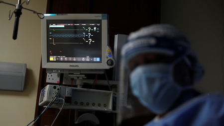 A monitor shows the vital signs of a mock coronavirus patient during an exercise simulating the treatment of a large number of patients due to the spread of the coronavirus disease (COVID-19) at the Aga Khan University Hospital in Nairobi.