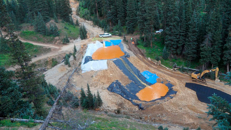 Yellow mine waste water from the Gold King Mine collects in holding pools in San Juan County, Colorado, is seen in this picture released by the Environmental Protection Agency (EPA) taken August 7, 2015. A contaminated plume of waste water accidentally released from a Colorado gold mine by U.S. environmental agency workers has spread downstream and reached northern New Mexico
