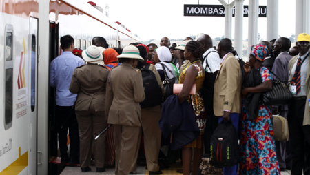 Kenyans wait to board a train at the Mombasa Terminus in Nairobi, Kenya Wednesday, May 31, 2017