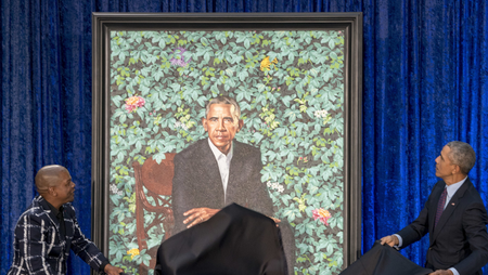 Former President Barack Obama, right, and Artist Kehinde Wiley, left, unveil Obama&#039;s official portrait at the Smithsonian&#039;s National Portrait Gallery, Monday, Feb. 12, 2018, in Washington.