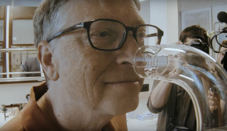 Bill Gates smelling a glass vial