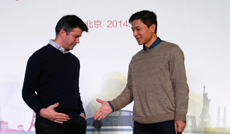 Kalanick (left) with Baidu Baidu chairman and CEO Robin Li.