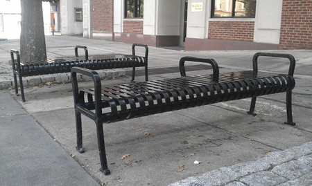 Benches with center bars to deter homeless sleepers