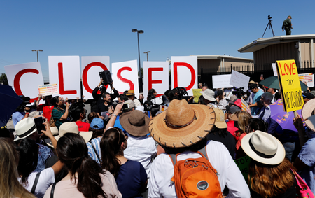 People protest against the Trump administration policy of separating immigrant families suspected of illegal entry, in front of the U.S. Customs and Border Protection building in El Paso, Texas, U.S., June 19, 2018. People protest against the Trump administration policy of separating immigrant families suspected of illegal entry, in front of the U.S. Customs and Border Protection building in El Paso, Texas, U.S., June 19, 2018.