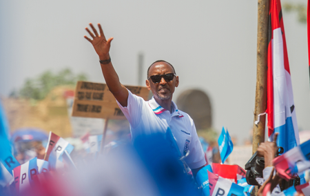 Rwandan President Paul Kagame of the ruling Rwandan Patriotic Front (RPF) waves to his supporters during his final campaign rally in Kigali, Rwanda August 2, 2017.