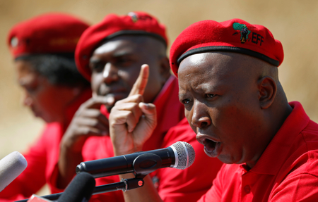Julius Malema, leader of South Africa&#039;s Economic Freedom Fighters (EFF), gestures during a media briefing in Alexander township near Sandton, South Africa August 17, 2016.