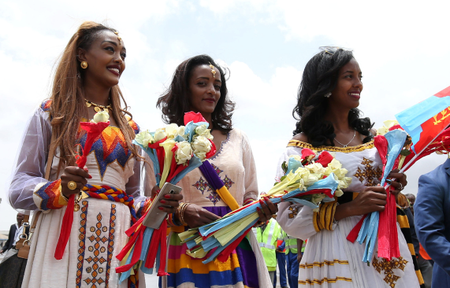 Eritreans wait to welcome their families at Asmara International Airport aboard the Ethiopian Airlines ET314 flight in Asmara, Eritrea July 18, 2018.