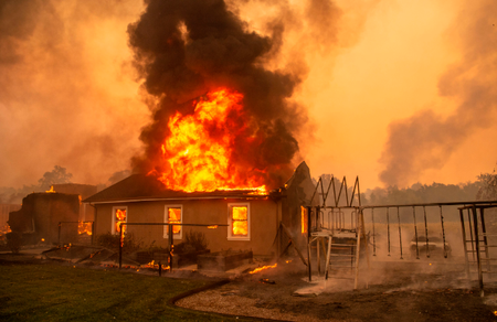 A home burns at a vineyard during the Kincade fire near Geyserville, California on Oct. 24.