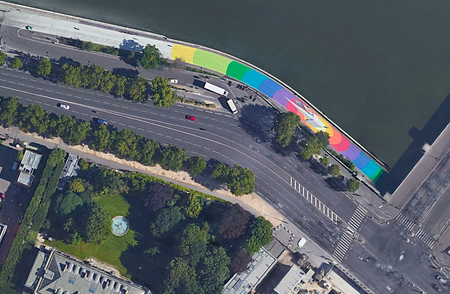 Grand murals adorn the pavement of the newly pedestrian-only road along the Seine