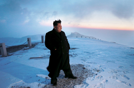 North Korean leader Kim Jong Un views the dawn from the summit of Mt Paektu April 18, 2015, in this photo released by North Korea&#039;s Korean Central News Agency (KCNA) on April 19, 2015.