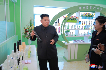 Kim Jong Un at the Pyongyang Cosmetics Factory in 2017.