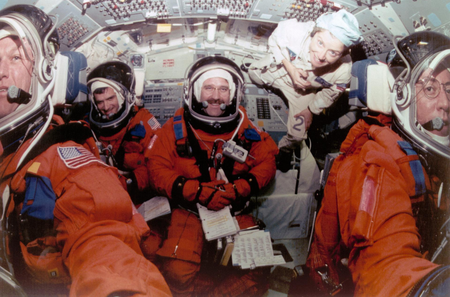 S97-00254 (17 Dec 1996) --- The STS-81 flight crew goes over pre-flight checklists on the flight deck of the Space Shuttle Atlantis during the final phase of the Terminal Countdown Demonstration Test (TCDT) exercises for the January 1997 mission